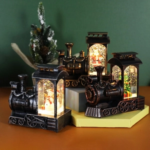 Christmas train water lantern with snowman and Santa scenes in vintage bronze and black finish