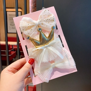 Three-piece baby headband set featuring white mesh bows, star sequins, and golden crown