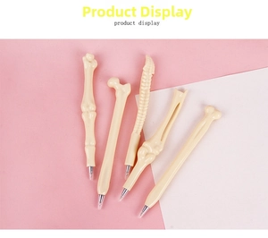 Detailed view of five creative bone-shaped ballpoint pens in various skeletal designs