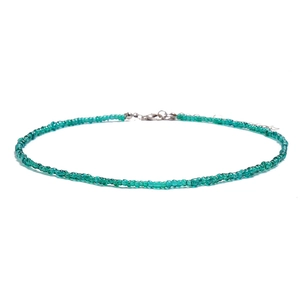 Bohemian green beaded short necklace with silver clasp on white background