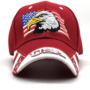 Detailed close-up of USA embroidery and bald eagle patch on dark red baseball cap