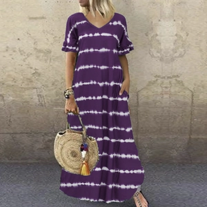 Detail of purple tie-dye maxi dress with V-neckline and ruffled cap sleeves
