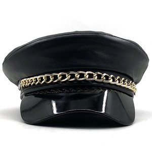 Black PU leather newsboy cap featuring a gold metal chain detail and shiny visor