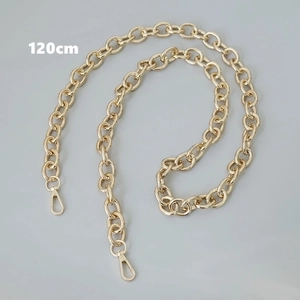 Detailed view of a 120cm polished gold metal chain strap with secure lobster clasps