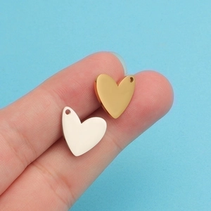 Minimalist heart-shaped jewelry pendants in gold and silver finish for DIY crafting