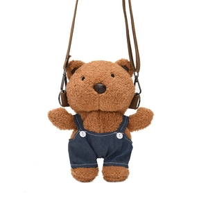 Cute brown plush bear crossbody bag wearing blue denim overalls with adjustable strap