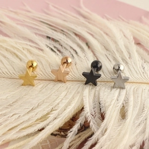 Stainless steel star tragus earrings set in gold, rose gold, black, and silver finishes