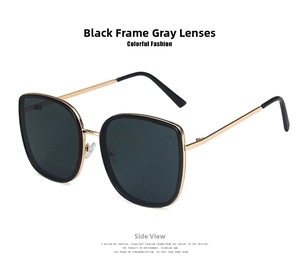 Detail of square white sunglasses with black frames and gold metal temples at 45-degree angle