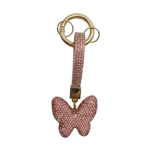Elegant rose gold butterfly keychain with sparkling crystals and metal rings on white background