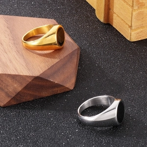 Polished titanium steel signet rings with black oval inlay in gold and silver finishes
