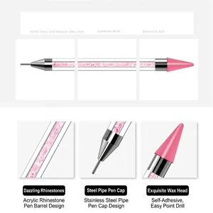 Dual-headed nail art dotting tool with pink rhinestone acrylic handle and wax tip