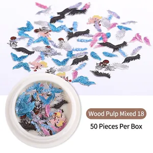 Makroaufnahme von 50 gemischten Zellstoffflocken für Nailart mit Engeln und Flügeln