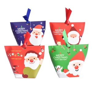 Colorful Christmas candy boxes set with festive prints and matching ribbons