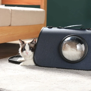 Navy blue breathable pet carrier with space capsule window and shoulder strap for cats