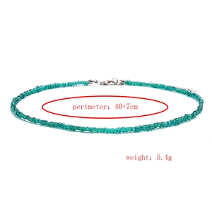 Detail view of handmade turquoise seed bead necklace with size and weight parameters