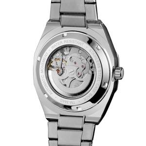 Detailed macro view of automatic mechanical movement through stainless steel case back