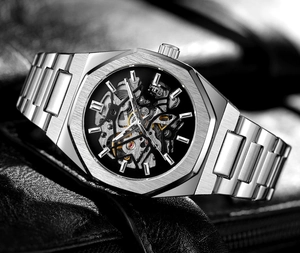 Detailed close-up of octagonal stainless steel case and skeleton mechanical movement