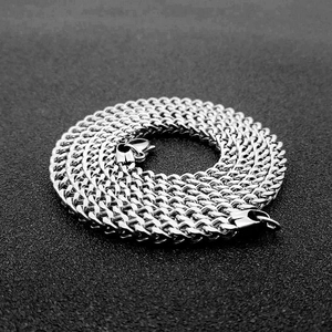 Polished silver stainless steel hip-hop curb chain necklace on dark background