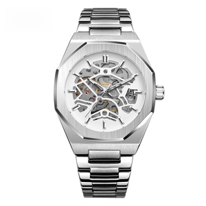 Macro shot of silver stainless steel skeleton mechanical watch with octagon bezel