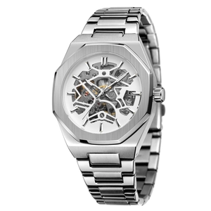 Macro shot of silver skeleton mechanical watch with octagonal bezel and metal strap
