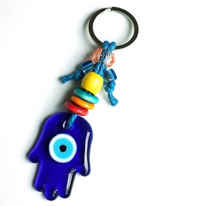 Hamsa Hand and Evil Eye glass keychain with colorful beads on a white background