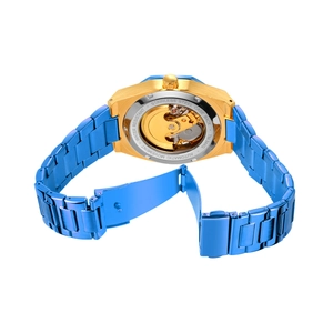 Macro view of automatic movement through clear back case of blue and gold watch