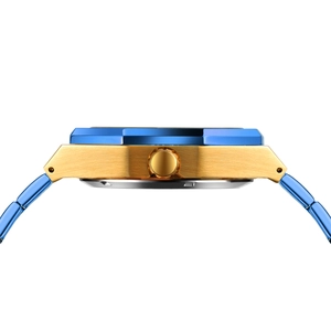 Detailed side view of luxury gold and blue skeleton watch case with brushed metal finish