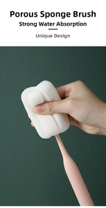 Long handle cup brush with pink anti-slip grip and porous white sponge head detail