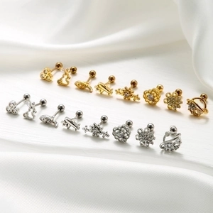 Surgical steel stud earrings set in gold and silver with clear cubic zirconia stones