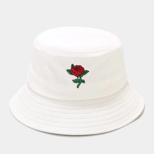 Close-up of red rose embroidery on white cotton canvas fisherman sun bucket hat