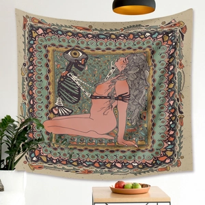 Detail of bohemian skull tapestry with floral patterns in a cozy room decor setting