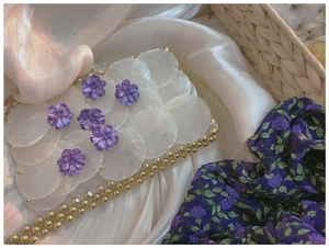 Exquisite handmade beaded evening bag with white shell sequins and purple floral accents