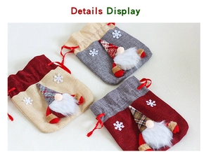 Detailed close-up of Christmas gnome burlap drawstring bags with 3D handmade character details