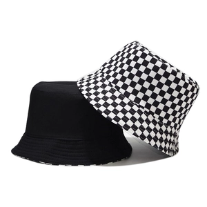 Classic reversible bucket hat in solid black and black-and-white checkerboard patterns