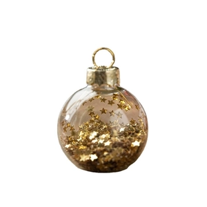 Transparent Christmas ball ornament filled with gold star sequins and a metallic gold cap