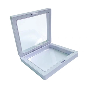 Detail of open white PE film floating frame display box showing transparent inner structure