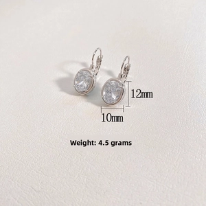 Detailed view of silver lever-back earrings with 12mm oval cubic zirconia stones