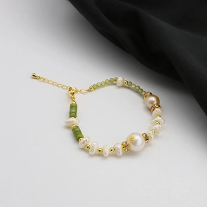 Detail showing natural freshwater pearls and green jade beads with 18k gold plating