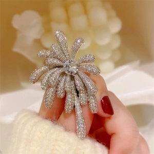 Elegant silver fireworks ring with sparkling full-set zircon crystals worn on finger