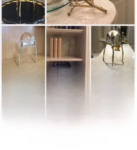 Detailed view of clear crystal ball on a golden branch-shaped metal base for home decor