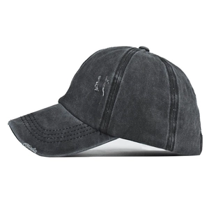 Distressed washed cotton ponytail baseball cap in dark grey with vintage torn brim details