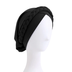 Black elastic turban hat with braided design for women shown on head mannequin