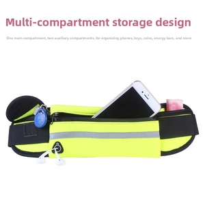 Detail of running belt showing phone and key storage in bright neon yellow fabric