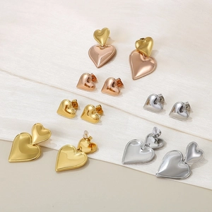Minimalist 18K gold plated heart stud earrings in various metallic finishes and styles