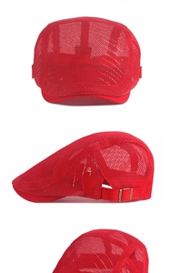 Detail view of red breathable mesh beret cap with adjustable metal side buckle