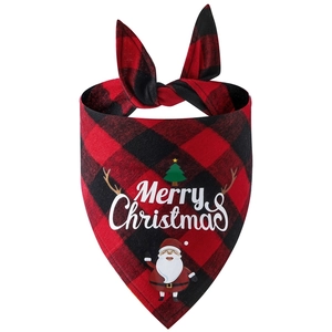 Detail of Christmas buffalo plaid pet bandana with Santa and tree patterns