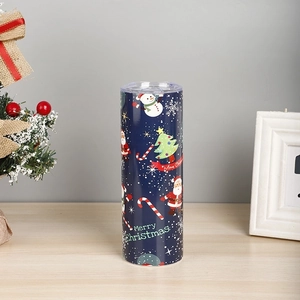 Detail shot of blue 20oz stainless steel Christmas tumbler with Santa and snowman patterns