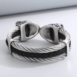 Men's steel cable lion head bracelet with silver and black braided leather texture
