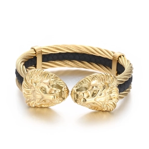 Men's double lion head gold-plated open bangle with black woven cable and steel trim