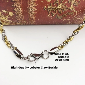 Detail of high-quality lobster clasp and reinforced jump ring on two-tone rope chain